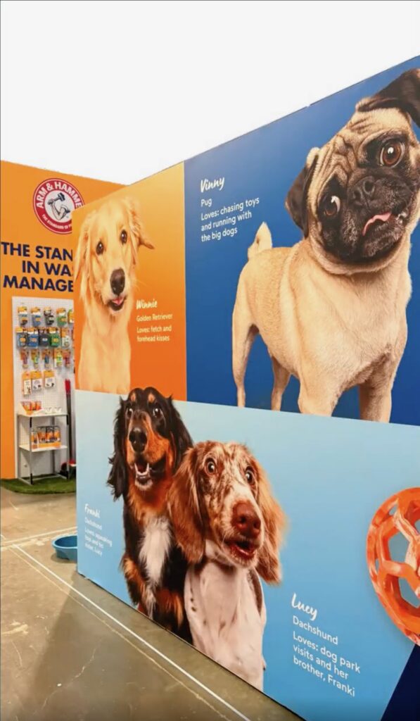 Petmate Chuckit booth at Global Pet Expo featuring photos taken by Haute Dog Pet Photography.